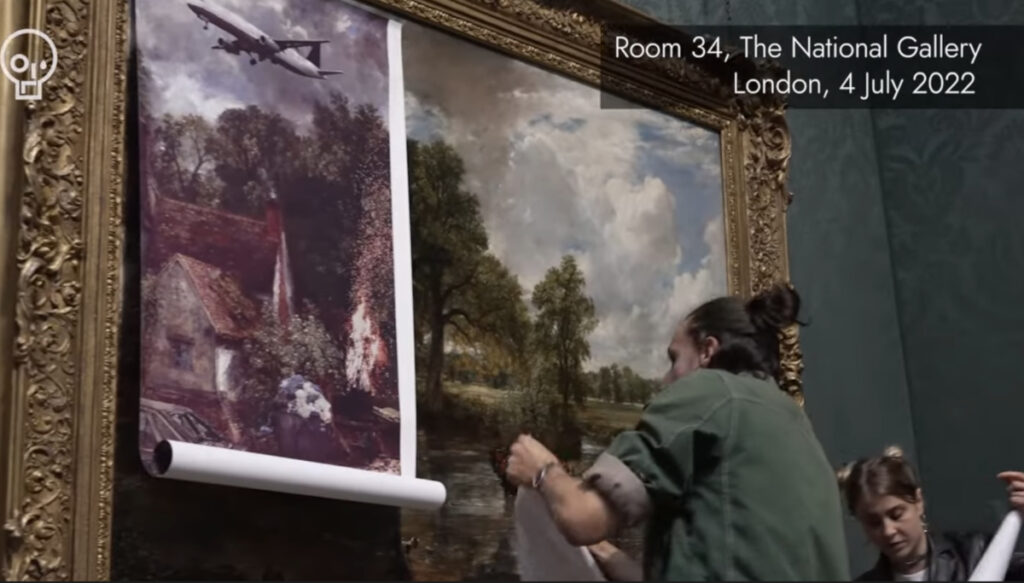 photo des militants couvrant le tableau d'une adaptation contemporaine de ce paysage