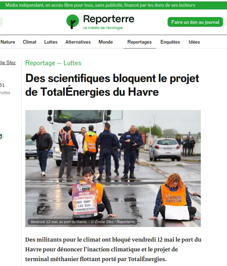 militants collés au bitume, police et circulation arrêtée article Reporterre