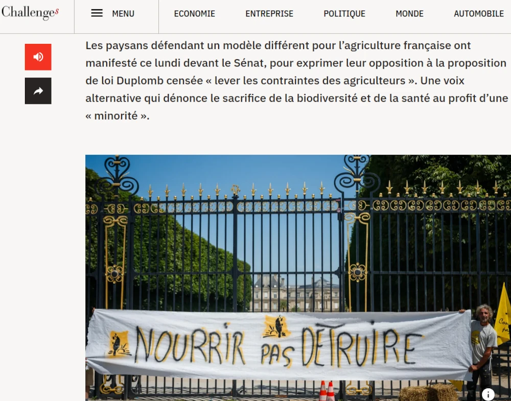 copie d'écran photo de banderole Nourrir pas détruire devant le sénat