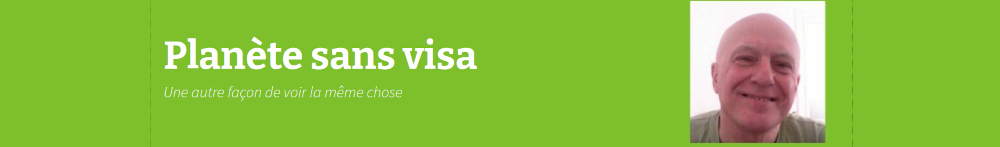 bandeau vert du site planète sans visa et photo de Fabrice Nicolino souriant