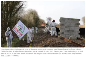 photo Ouest France mur de moellon bloque un train alimentant l'usine Sanders